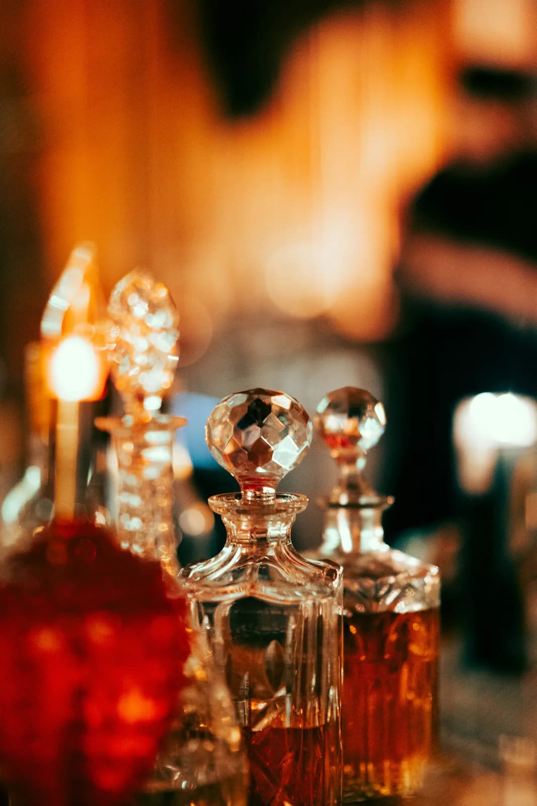 Elegant perfume bottles arranged on a styled surface